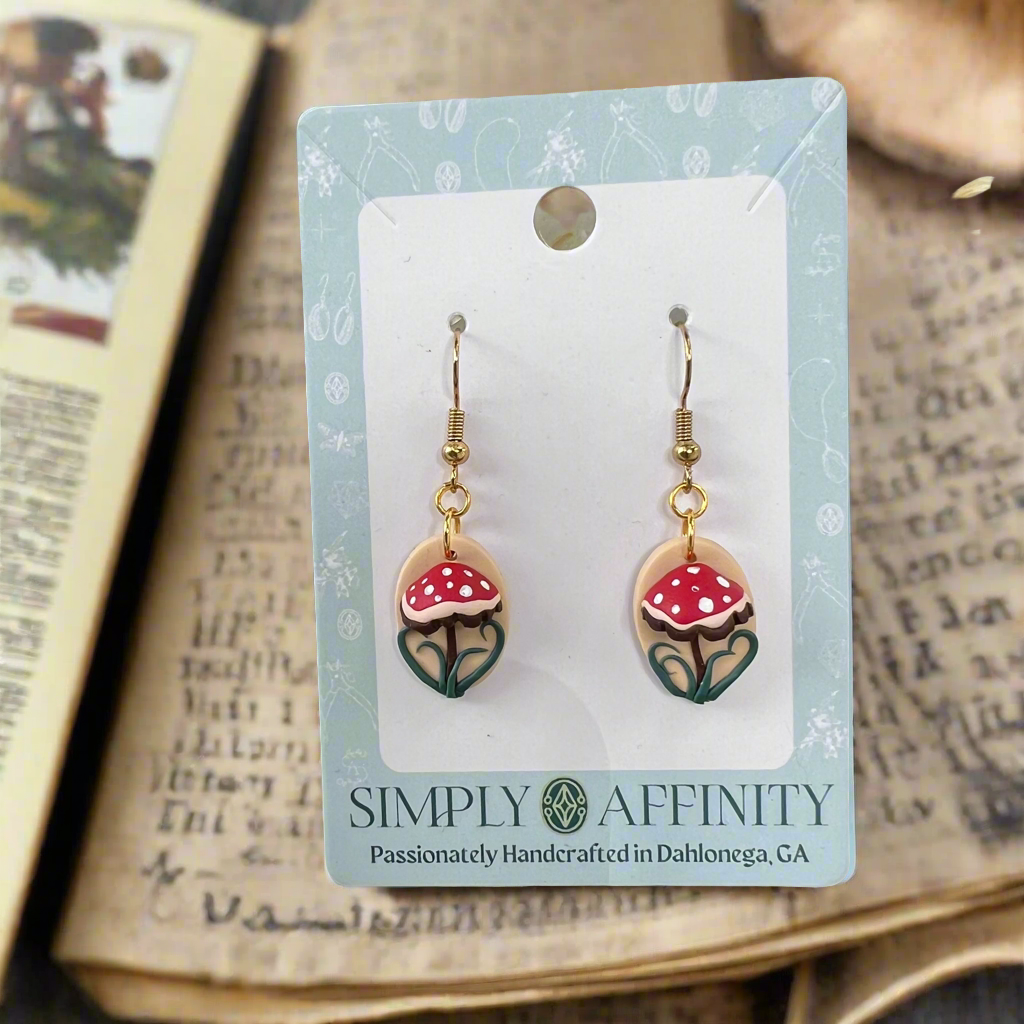 3-D Mushroom Earrings on Beige Oval
