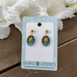 Daffodils on Green Oval Earrings