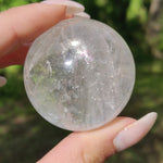 Clear Quartz Sphere with Rainbow Inclusions (#7)